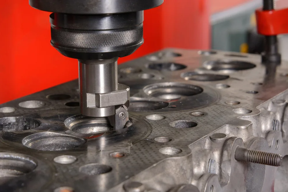 Precision boring of a valve seat on a cylinder head machining tool